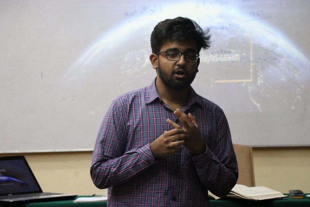 Instructor with earth visual