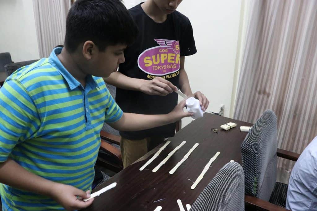Child constructing glider