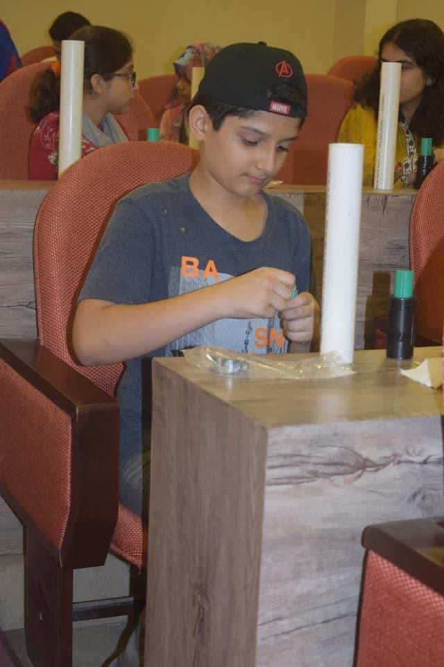 Boy assembling project