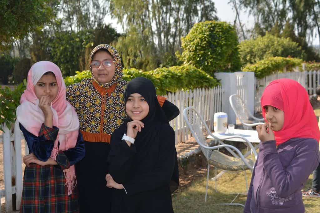 Girls learning gardening