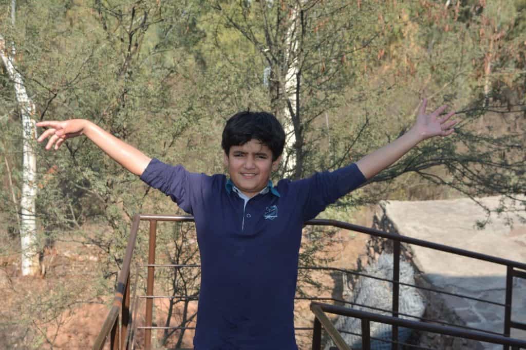 Boy celebrating gardening