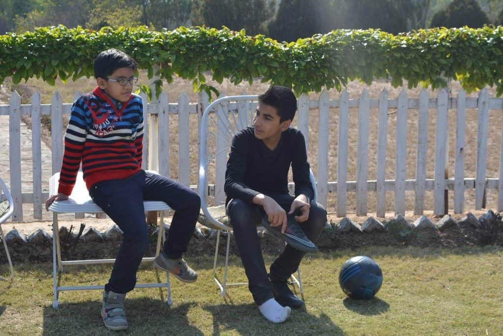 Seated students after gardening