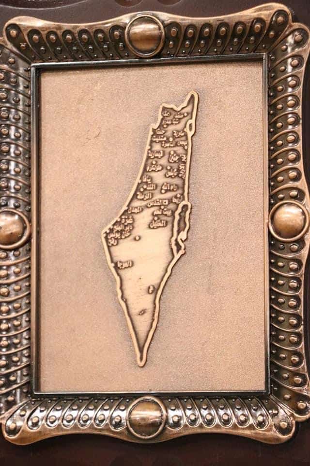 Wood carving of Palestine map