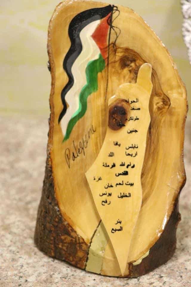 Wooden log with carved map